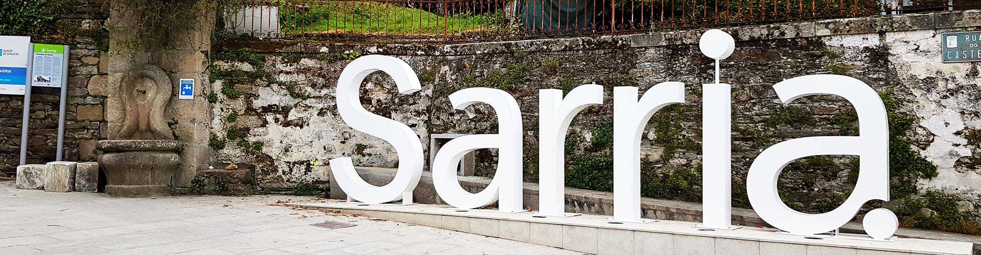 sarria sign in town