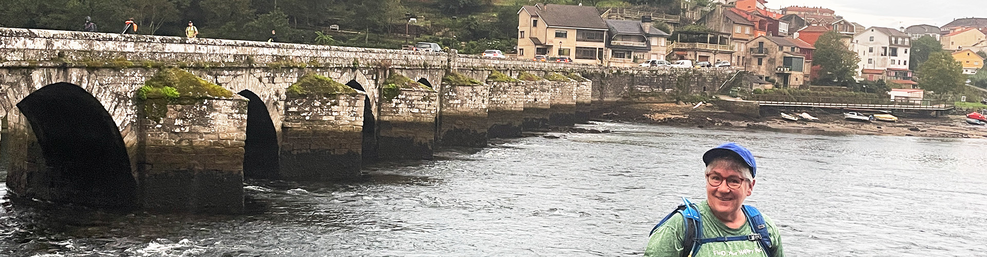 pilgrim by bridge on the Camino portugues