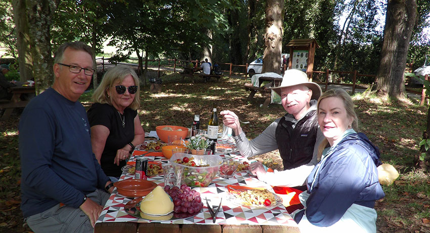 Pilgrims enjoying a picnic on a Camino Guided Tour
