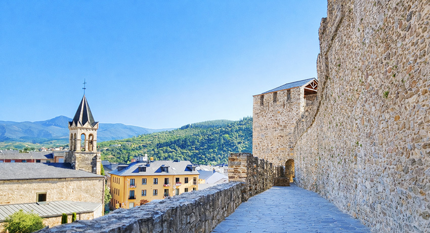 stone walkway with village view on Camino
