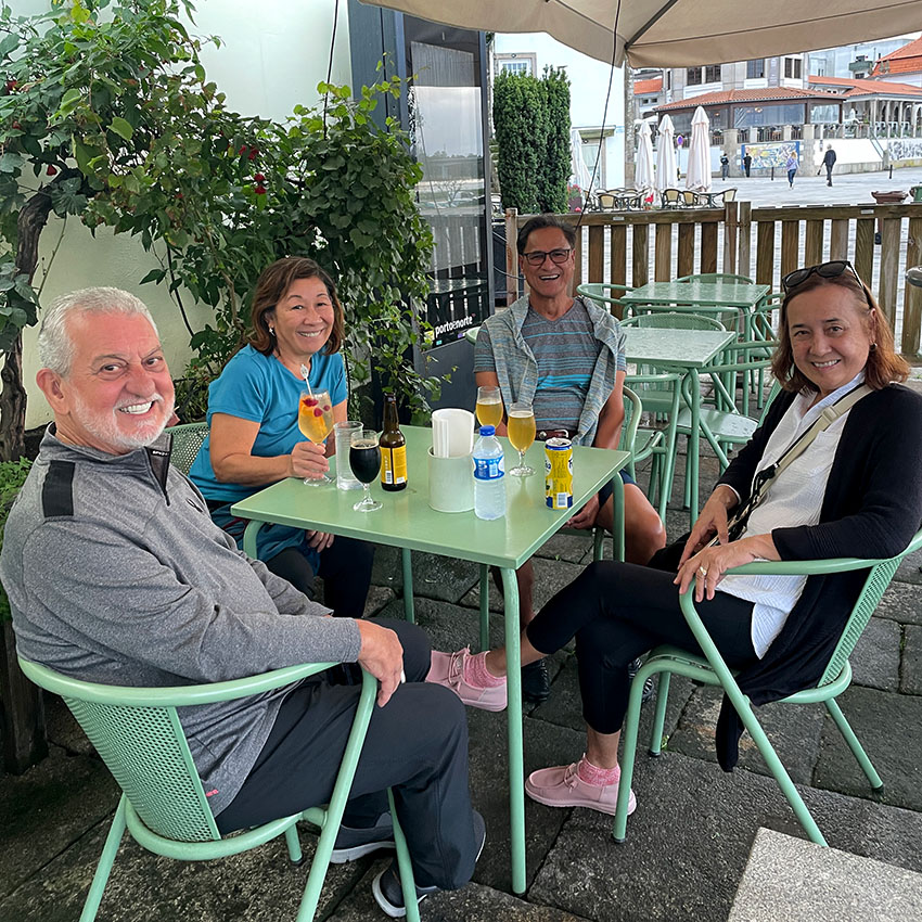 pilgrims enjoying a break at a cafe with drinks