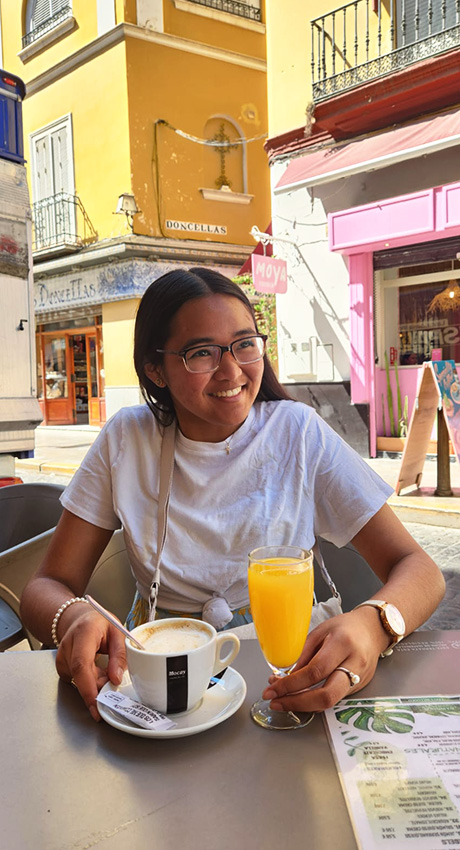 having breakfast on table with coffee and juice on a cafe