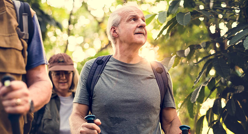 Seniors trekking on trail