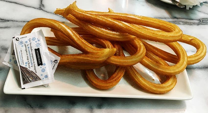 churros with sugar on plate