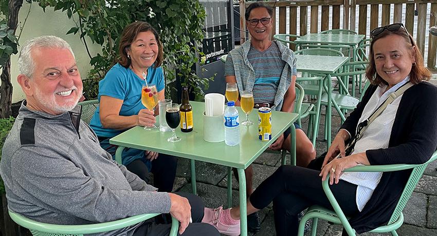 pilgrims sitting in a cafe relaxing with drinks