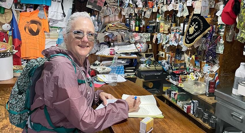 pilgrim collecting stamps on passport