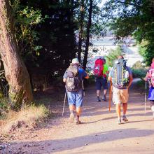 pilgrims walking on the trail