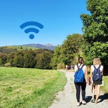 pilgrims walking with WiFi sign on background